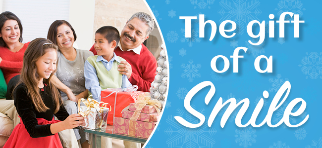 Family giving the gift of a smile during the holidays