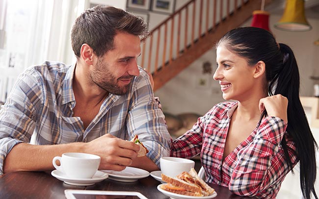 A man and woman enjoying lunch after a regular visit with their Marietta OH dentist.