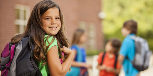 Kid headed back to school with a healthy smile