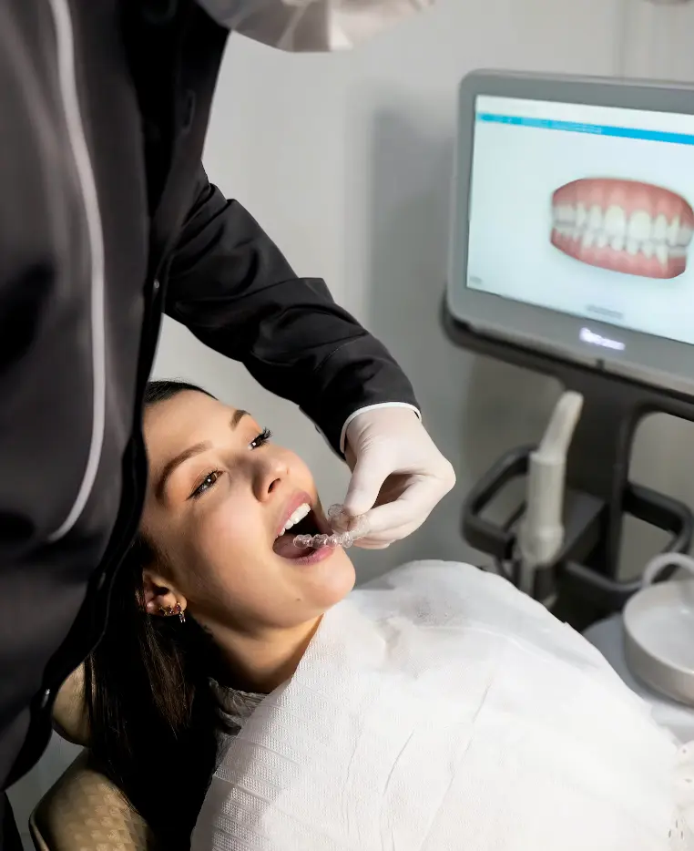 Girl getting teeth cleaned